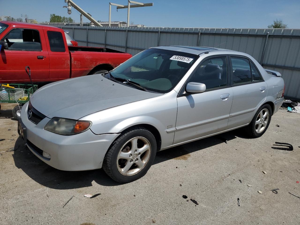 2001 Mazda Protege Lx იყიდება Kansas City-ში, KS - Rear End