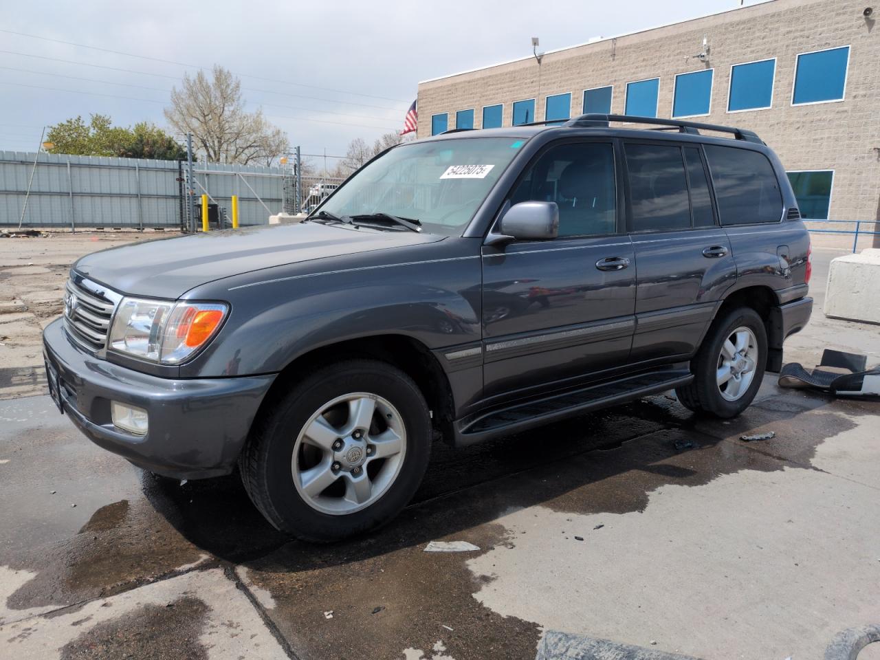 2004 Toyota Land Cruiser na sprzedaż w Littleton, CO - Side
