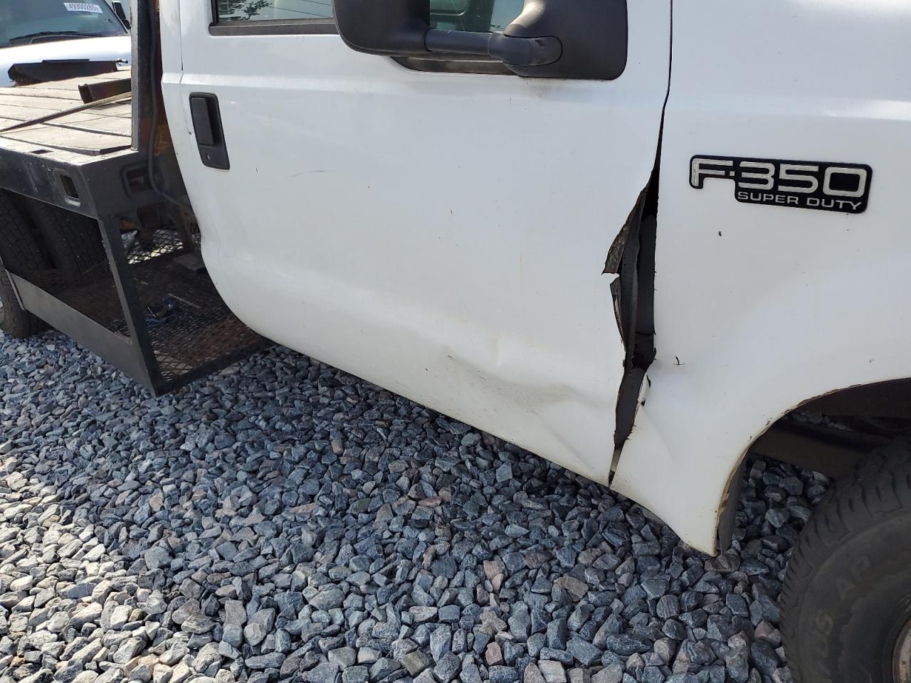 1999 Ford F350 Super Flatbed Truck VIN: 1FDWF36S5XEA86482 Lot: 50220585