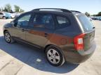 2010 Kia Rondo Lx for Sale in Orlando, FL - Side