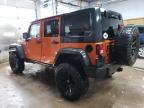 2011 Jeep Wrangler Unlimited Rubicon na sprzedaż w Kincheloe, MI - Top/Roof