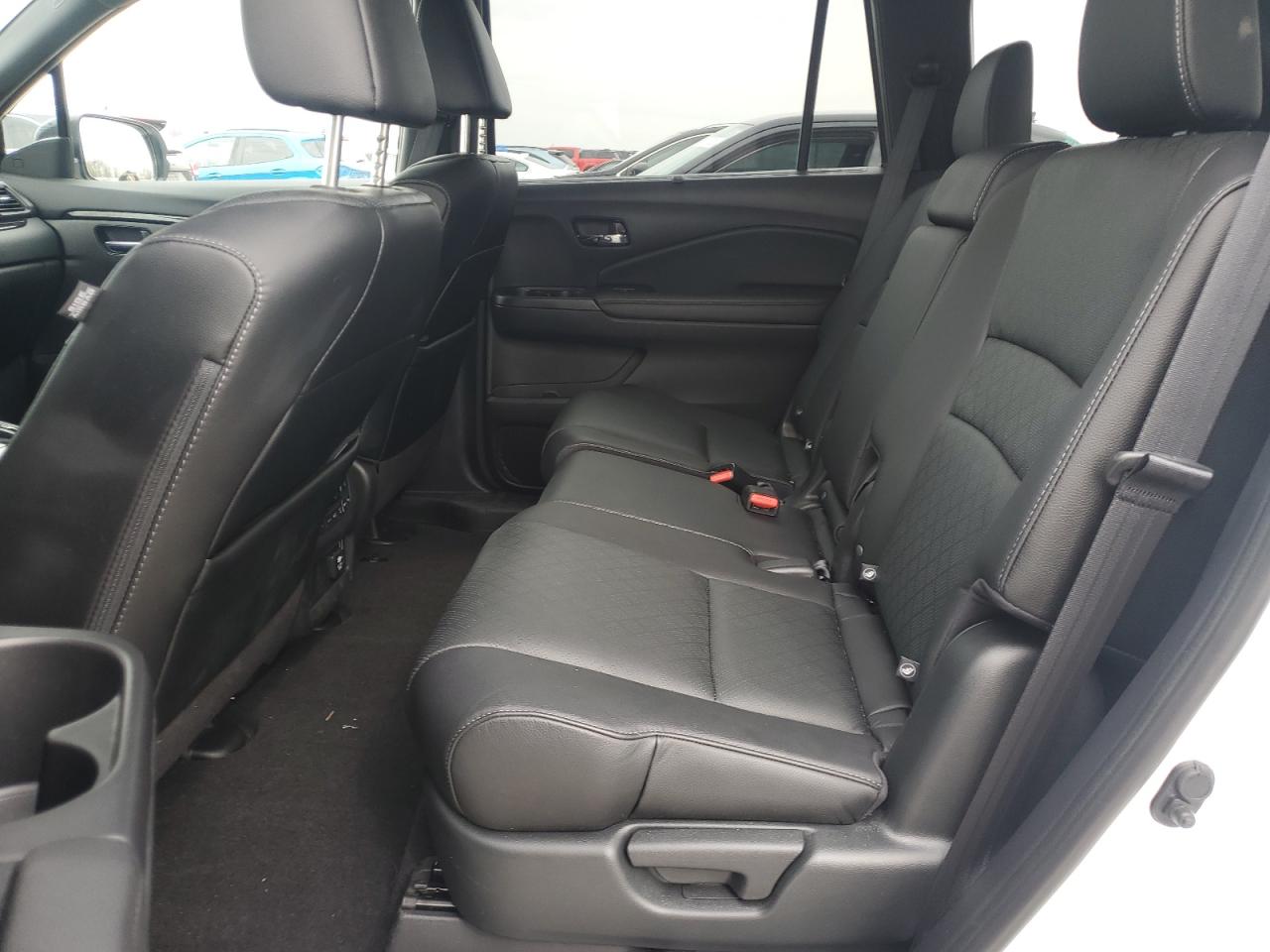 2021 Honda Passport Touring VIN: 5FNYF8H94MB001856 Lot: 53511485