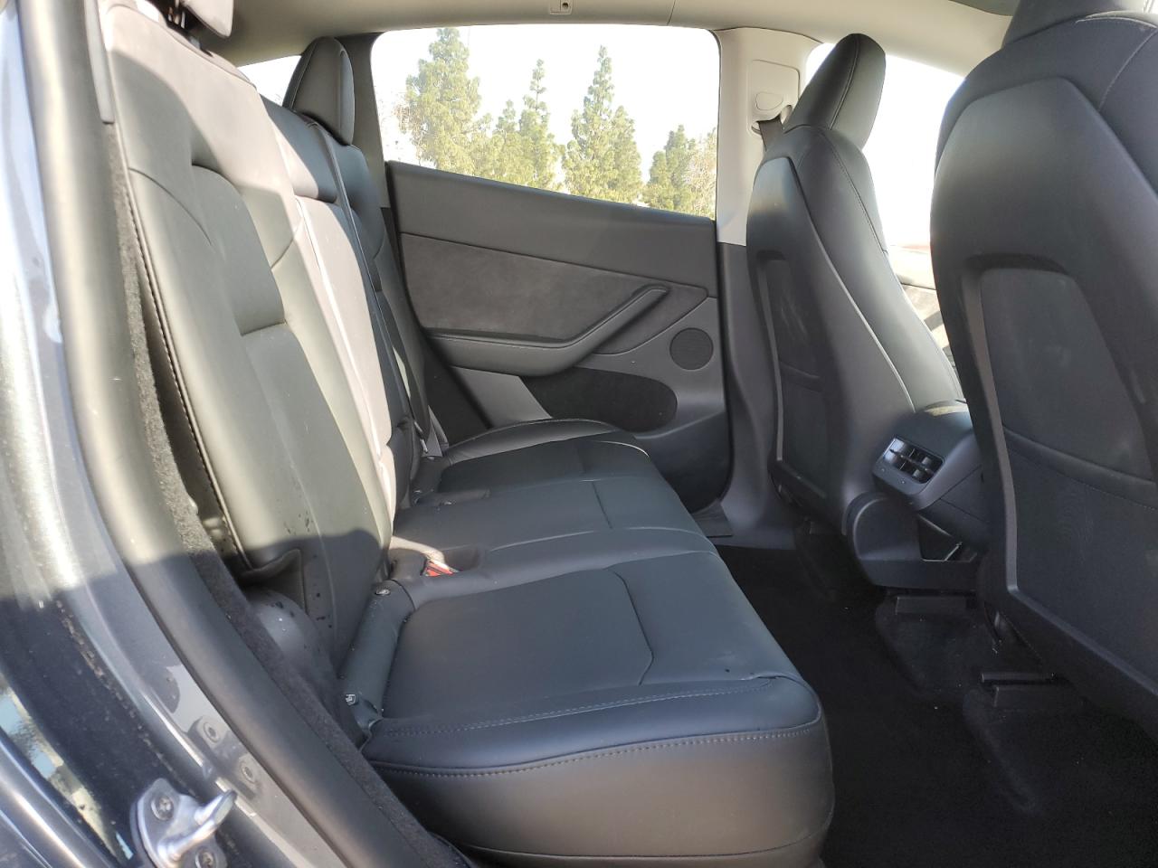 2023 Tesla Model Y VIN: 7SAYGDEE5PA028768 Lot: 51076875