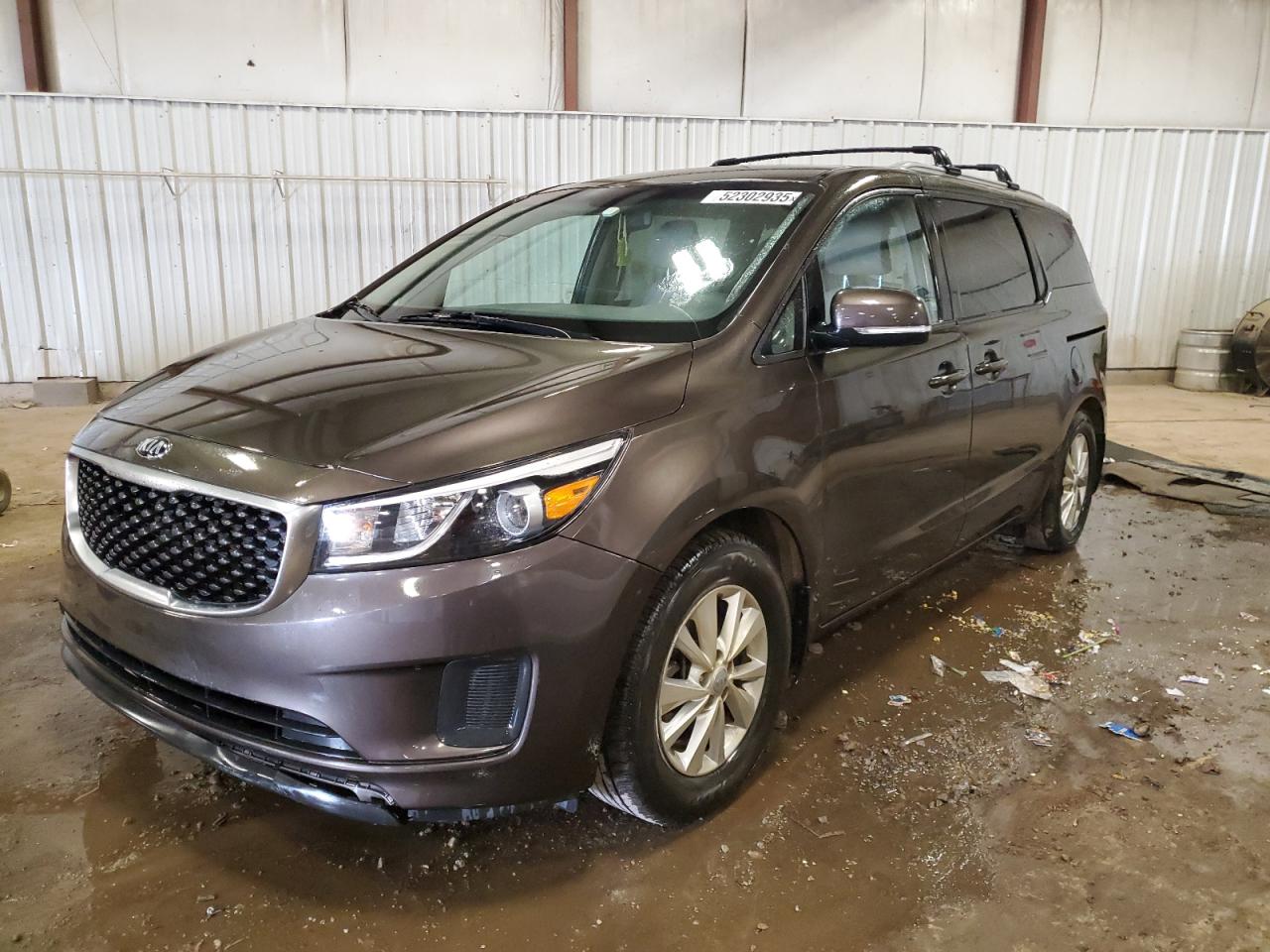 2016 Kia Sedona Lx للبيع في Lansing، MI - Side
