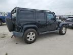 2011 Jeep Wrangler Unlimited Sahara zu verkaufen in Wilmer, TX - Side