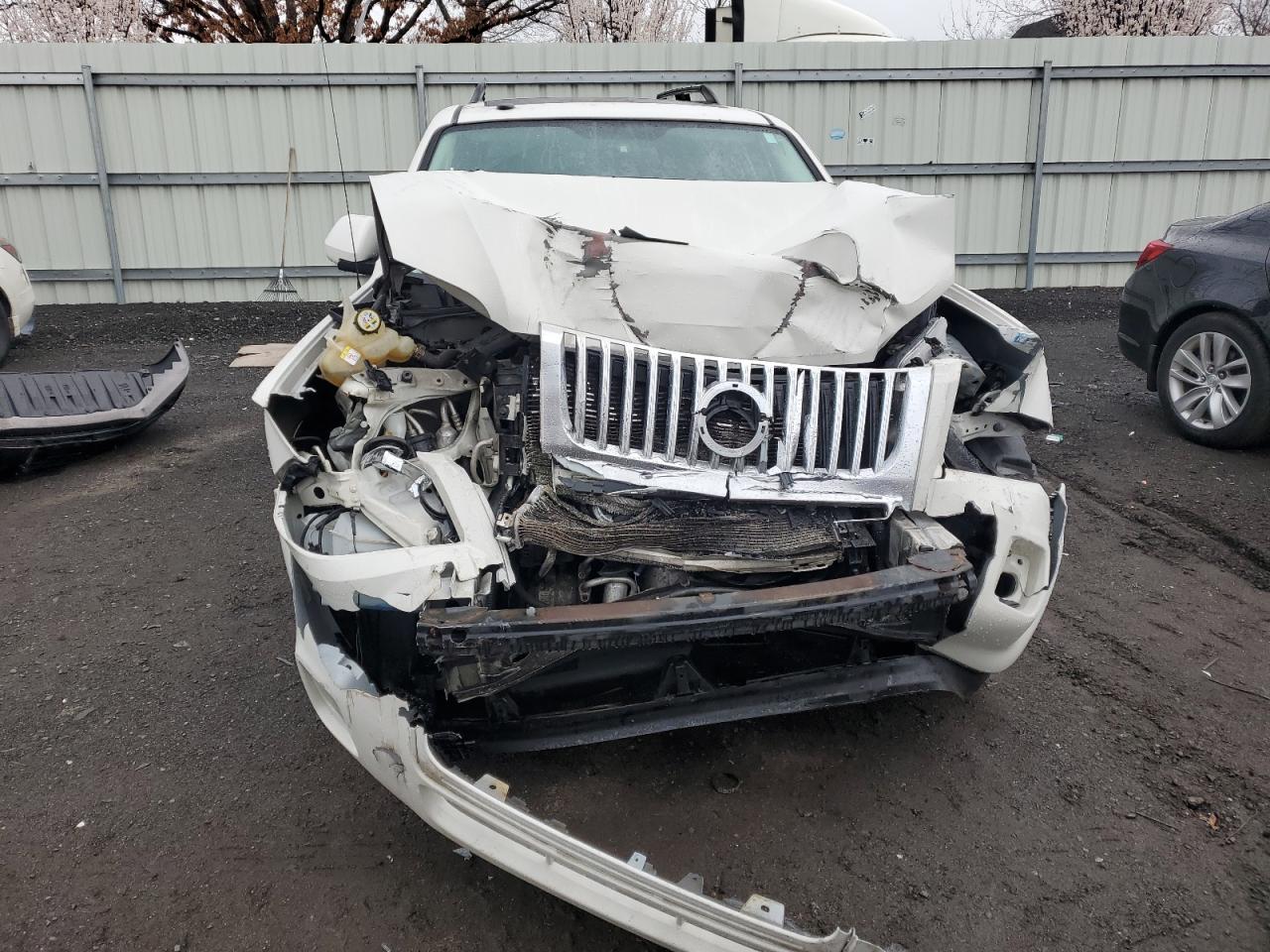 2009 Mercury Mariner Premier VIN: 4M2CU97G59KJ16931 Lot: 53111905