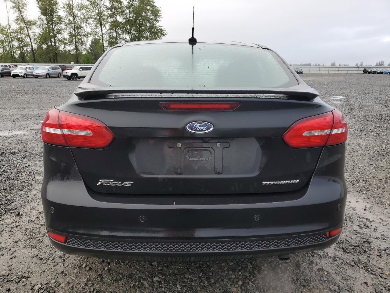 2015 Ford Focus Titanium VIN: 1FADP3J23FL269878 Lot: 55171975