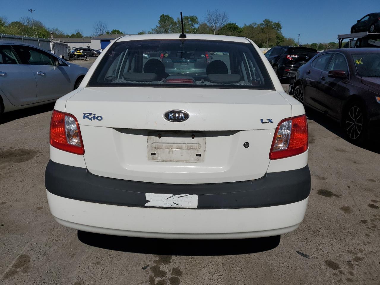 2009 Kia Rio Base VIN: KNADE223296502893 Lot: 54206415