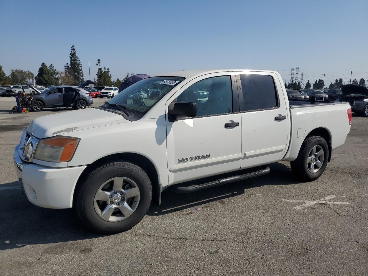1N6AA0EKXBN322210 NISSAN TITAN Photo 1