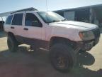 1999 Jeep Grand Cherokee Laredo na sprzedaż w Fresno, CA - Side
