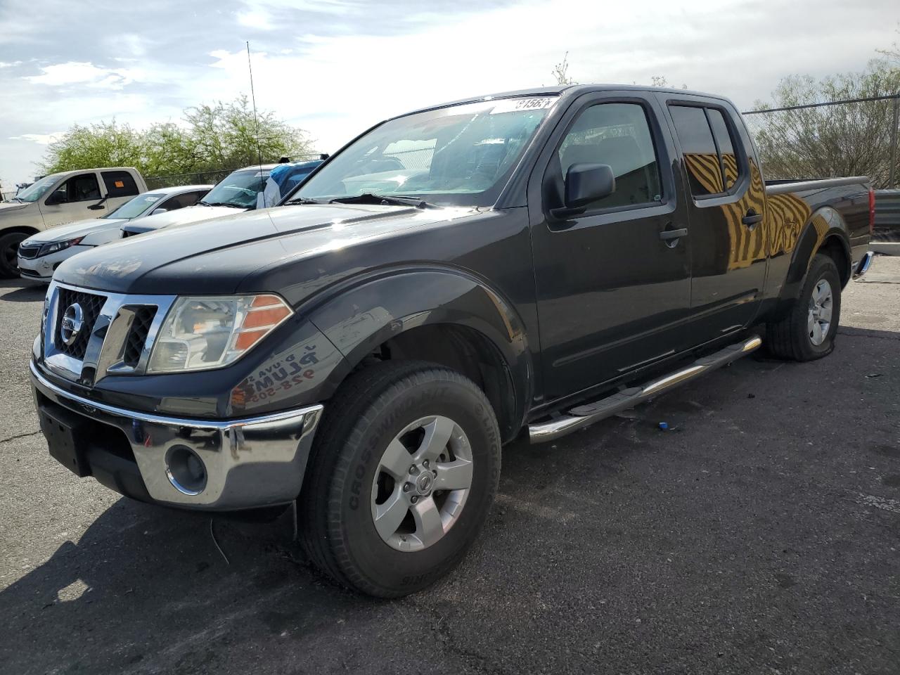 2010 Nissan Frontier Crew Cab Se for Sale in North Las Vegas, NV - Side