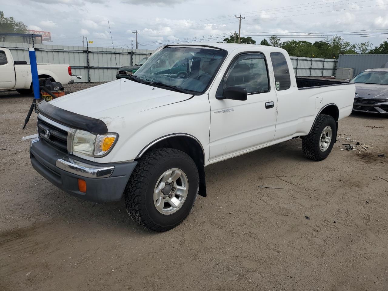 1999 Toyota Tacoma Xtracab zu verkaufen in Newton, AL - Side