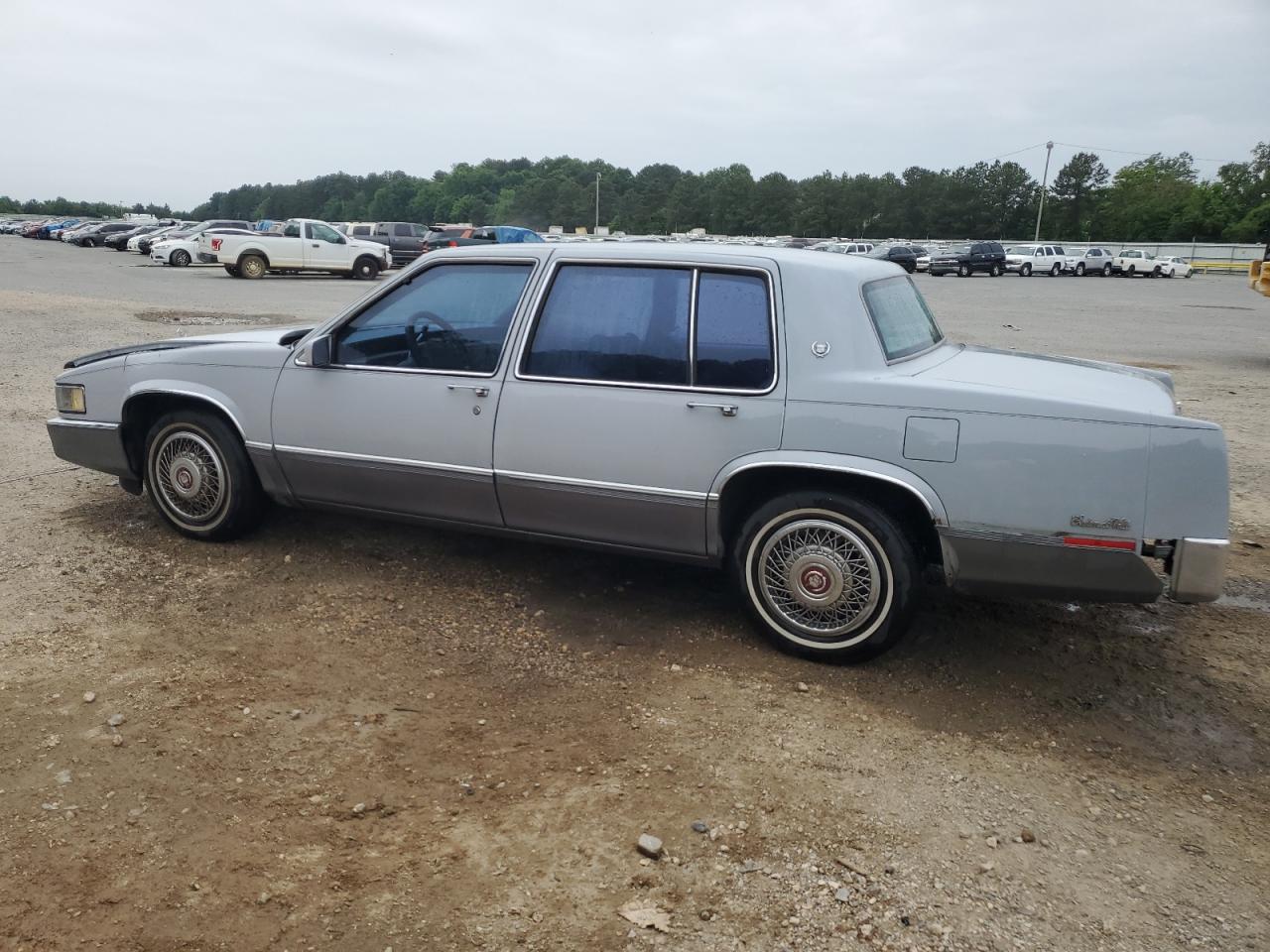 1990 Cadillac Deville VIN: 1G6CD5335L4264884 Lot: 54398355