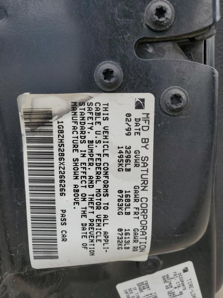 1999 Saturn Sl1 VIN: 1G8ZH5286XZ266266 Lot: 52543495