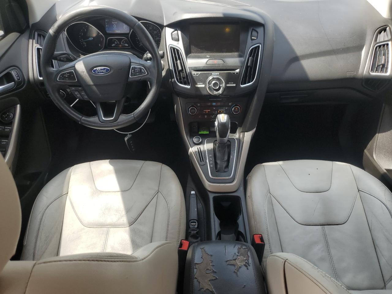 2016 Ford Focus Titanium VIN: 1FADP3J28GL232746 Lot: 53209645
