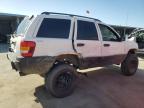 1999 Jeep Grand Cherokee Laredo na sprzedaż w Fresno, CA - Side