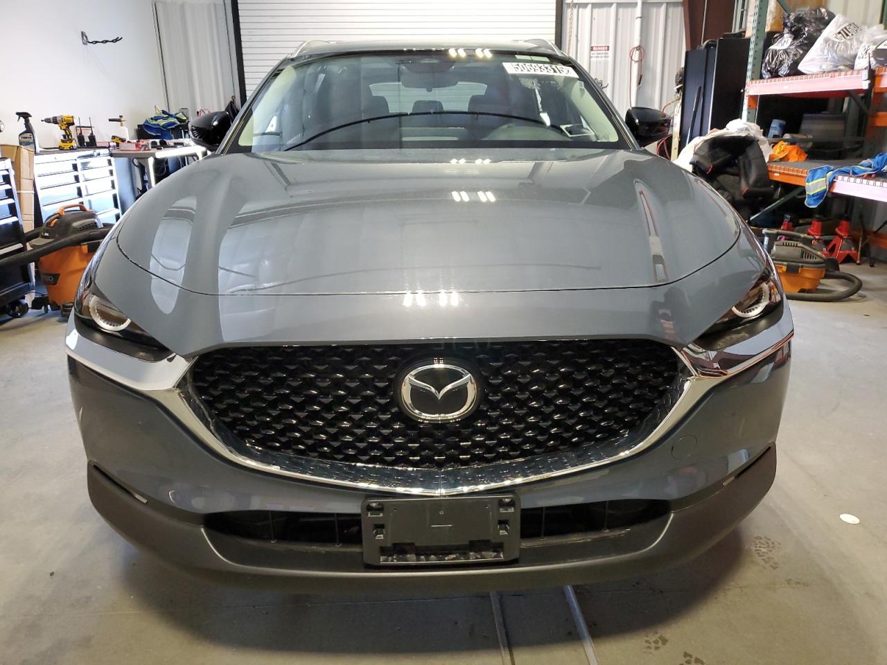 2025 MAZDA CX30 with SIDE damage, VIN 3MVDMBCM0SM809688