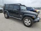 2011 Jeep Wrangler Unlimited Sahara zu verkaufen in Wilmer, TX - Side