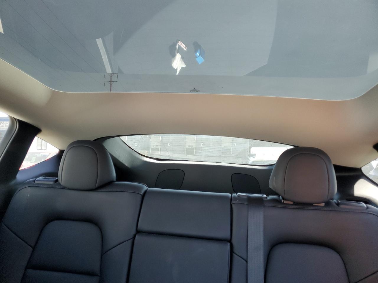 2023 Tesla Model Y VIN: 7SAYGDEE9PA073857 Lot: 52558805