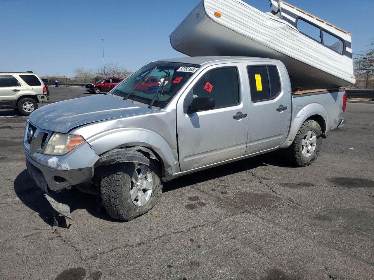2009 Nissan Frontier Crew Cab Se zu verkaufen in North Las Vegas, NV - Front End