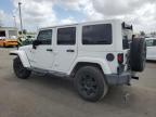 2014 Jeep Wrangler Unlimited Sahara للبيع في Miami، FL - Front End