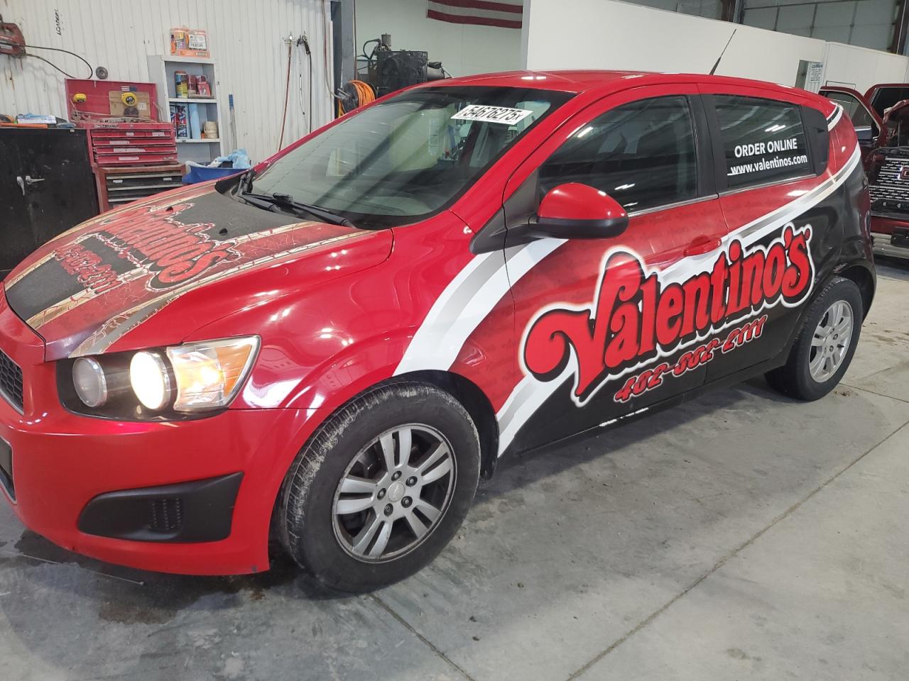 1G1JC6SH1E4136986 CHEVROLET SONIC Photo 1