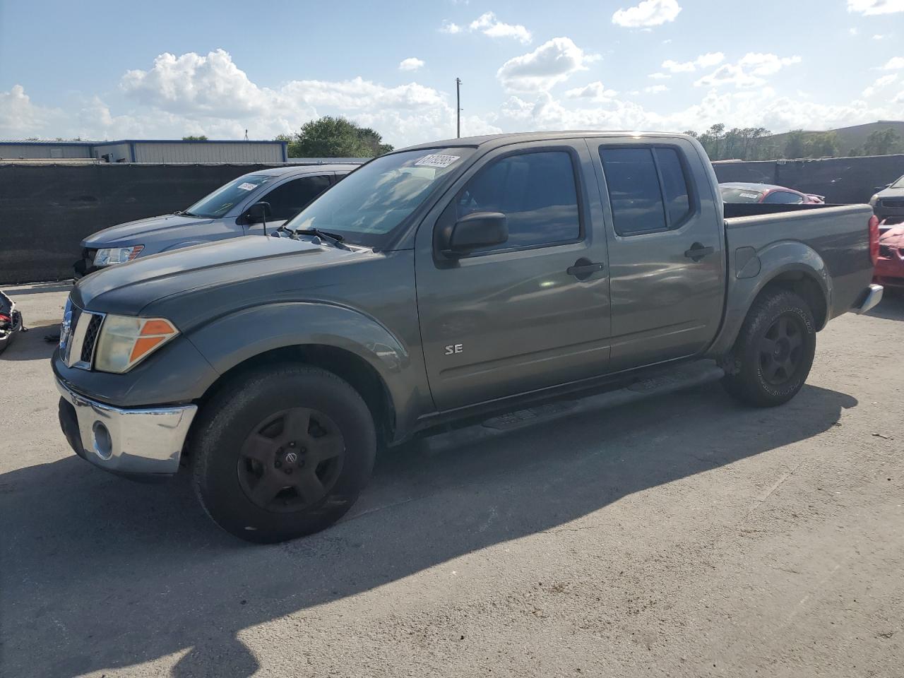 2007 Nissan Frontier Crew Cab Le for Sale in Orlando, FL - Minor Dent/Scratches