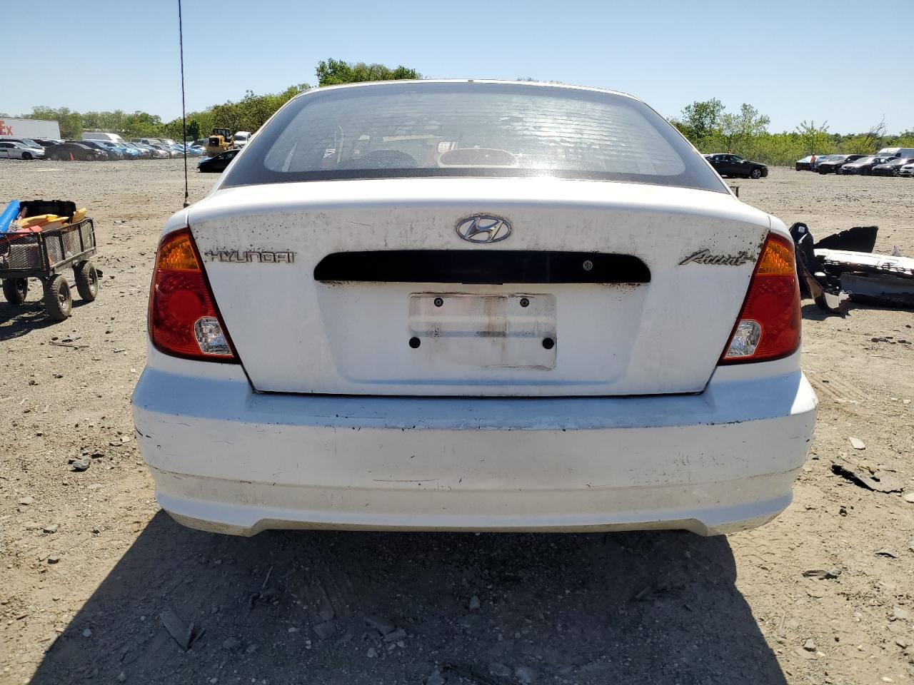 2003 Hyundai Accent L VIN: KMHCF35C53U240220 Lot: 52581415