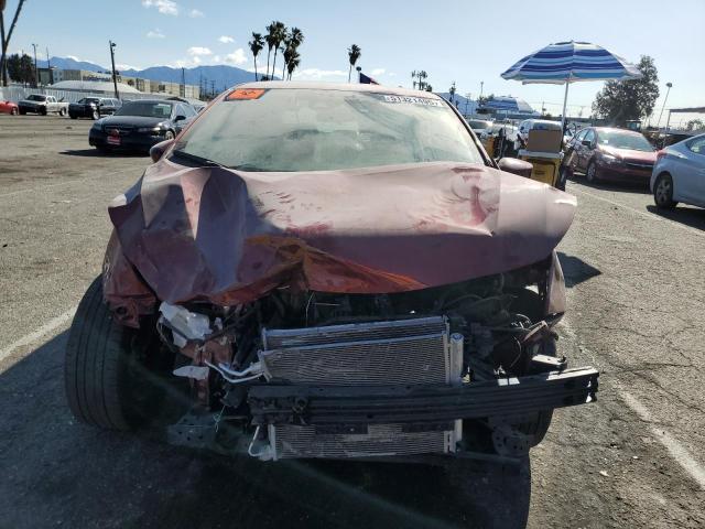  NISSAN VERSA 2024 Червоний