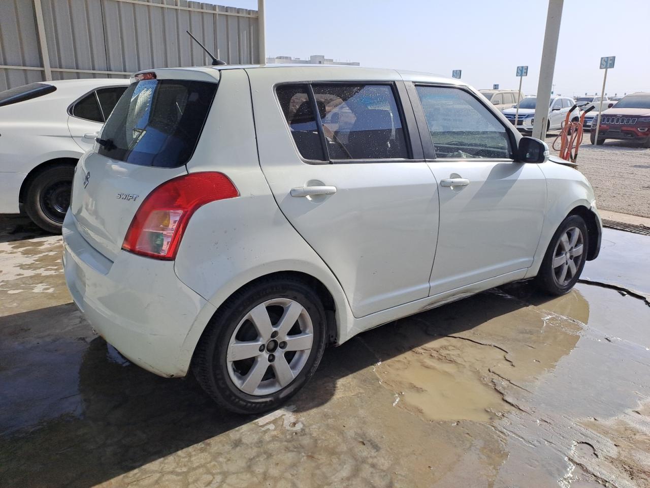 JS2ZC21S3A5556419 - 2010 Suzuki SWIFT - #undefined