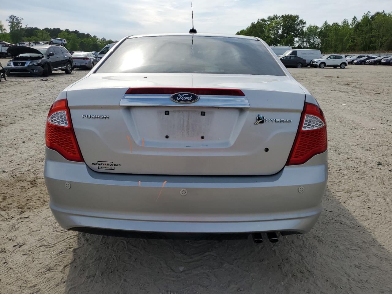 2010 Ford Fusion Hybrid VIN: 3FADP0L39AR412573 Lot: 54019145