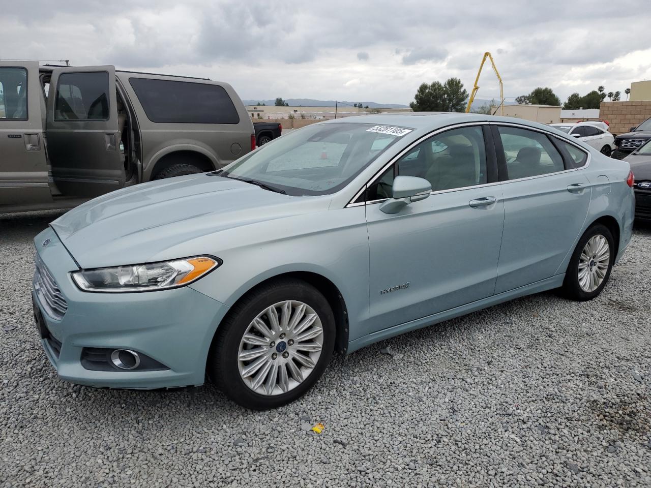 2013 Ford Fusion Se Hybrid იყიდება Mentone-ში, CA - Front End
