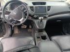 2HKRM4H77FH****** Wrecked 2015 Honda CR-V in AK - Anchorage