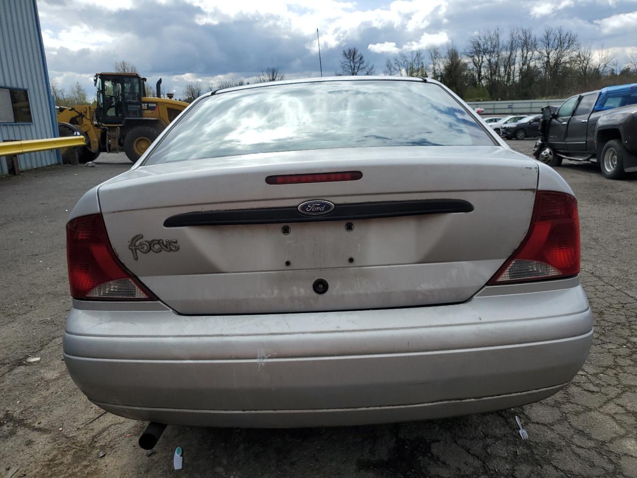 2004 Ford Focus Lx VIN: 1FAFP33PX4W132594 Lot: 65552465