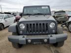 2014 Jeep Wrangler Unlimited Sahara იყიდება Elgin-ში, IL - Side
