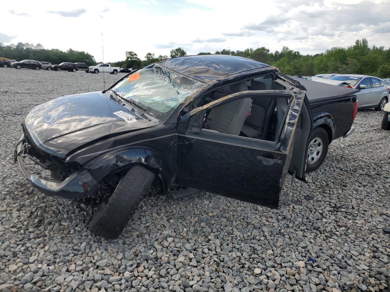 2009 Nissan Frontier King Cab Xe na sprzedaż w Byron, GA - Rollover