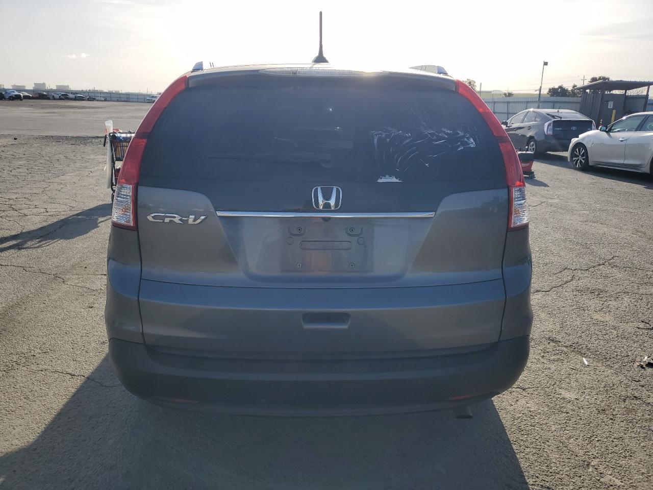 2012 Honda Cr-V Exl VIN: JHLRM3H71CC004398 Lot: 51950445