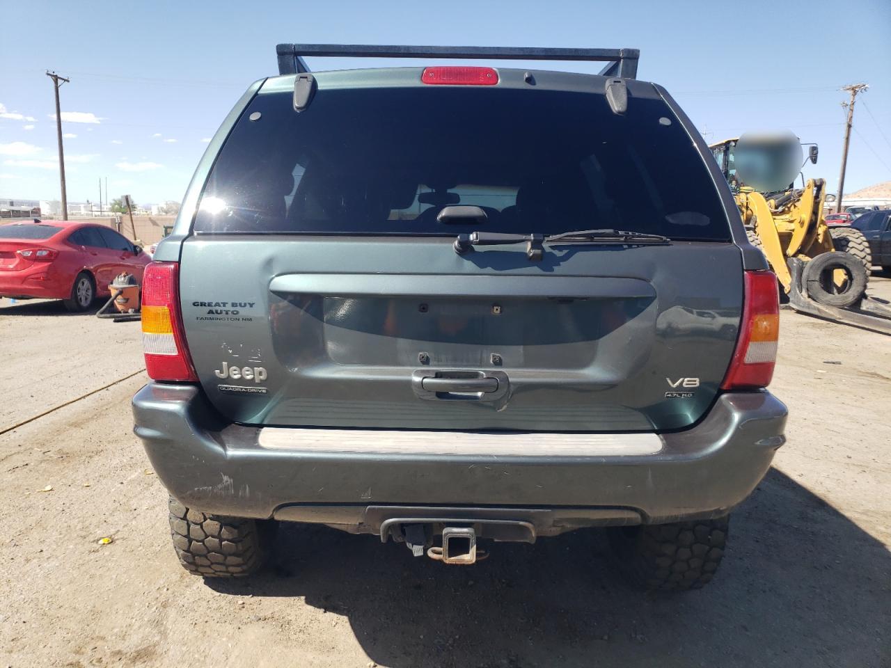 2002 Jeep Grand Cherokee Overland VIN: 1J8GW68J32C323210 Lot: 54000555