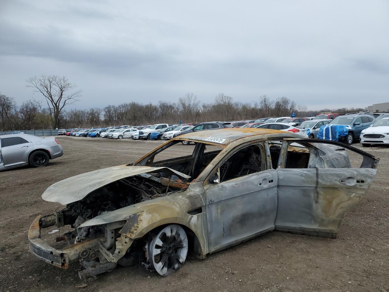 2010 Ford Taurus Sel продається в Des Moines, IA - Burn