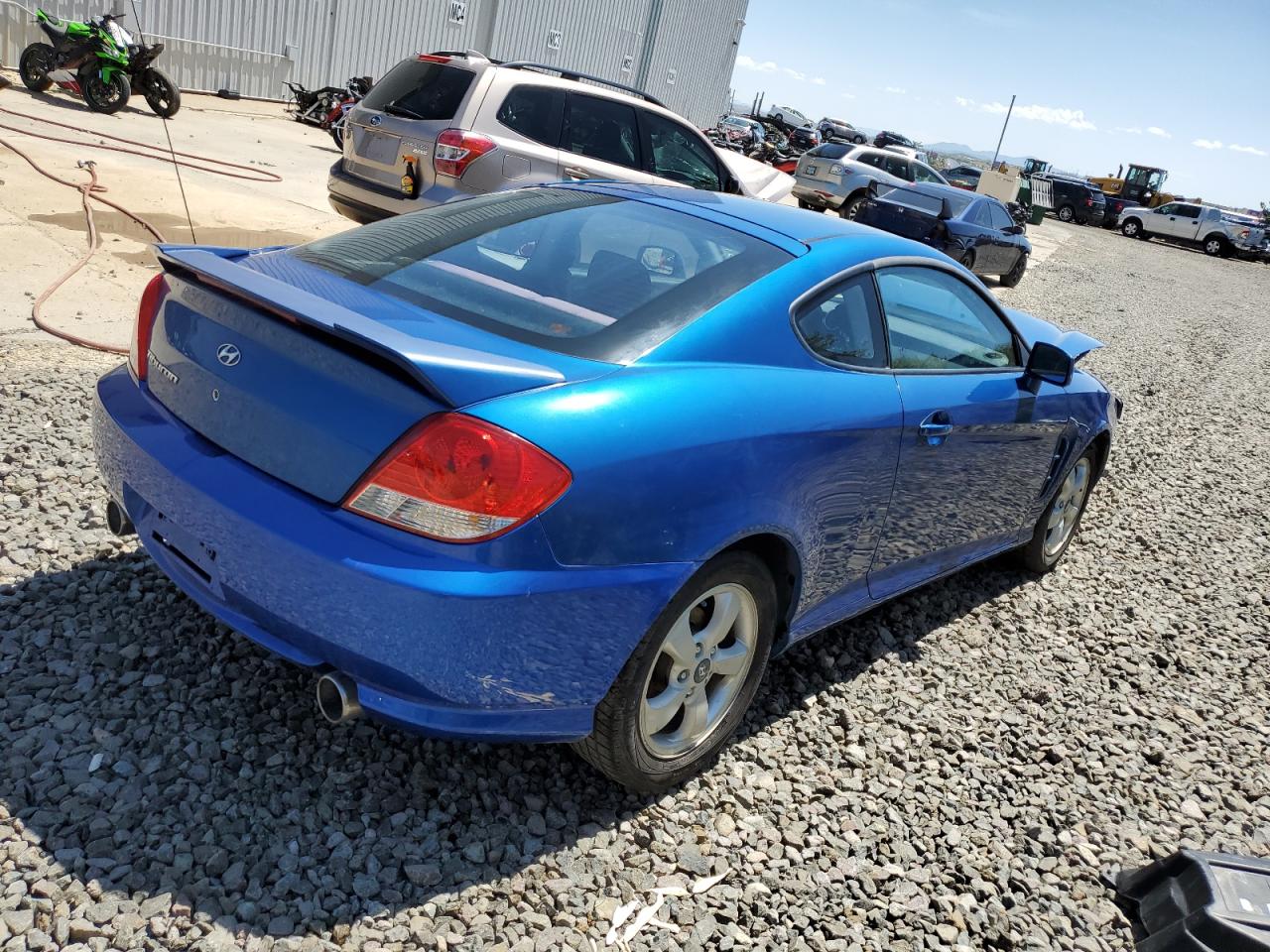 2005 Hyundai Tiburon VIN: KMHHM65D55U174521 Lot: 53217013