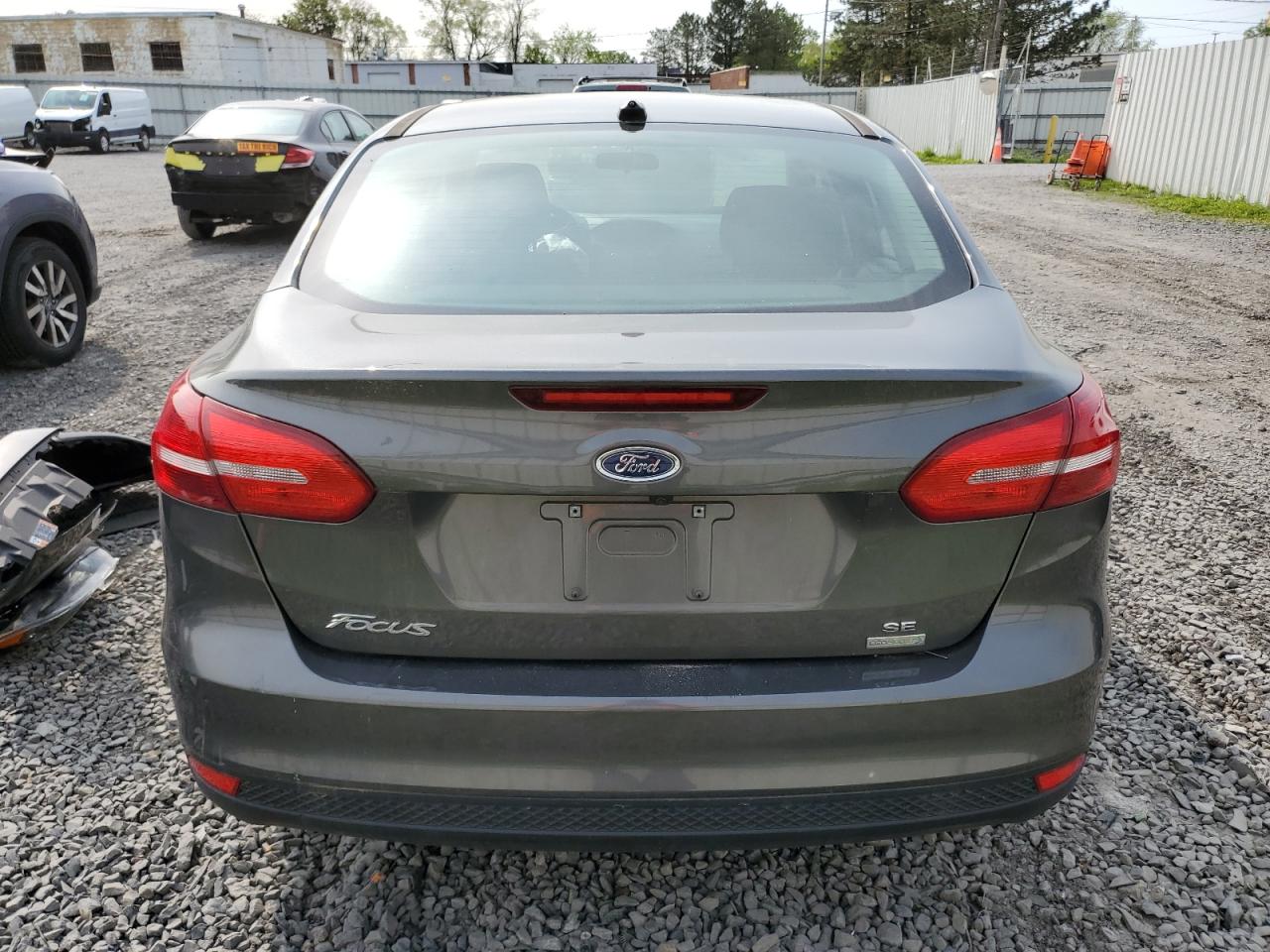 2018 Ford Focus Se VIN: 1FADP3FE5JL286354 Lot: 82125594