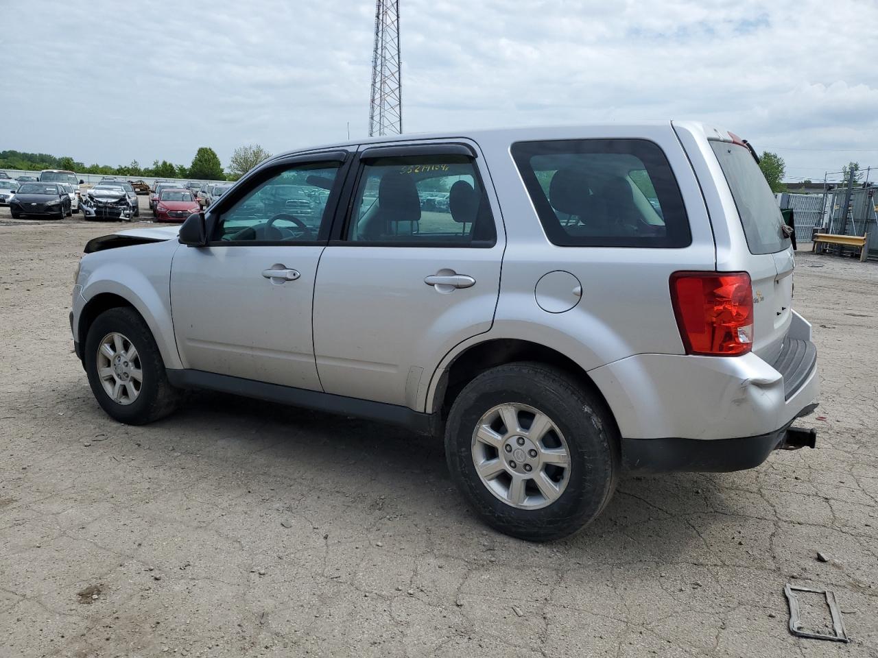 2010 Mazda Tribute I VIN: 4F2CY0C74AKM05590 Lot: 55279104