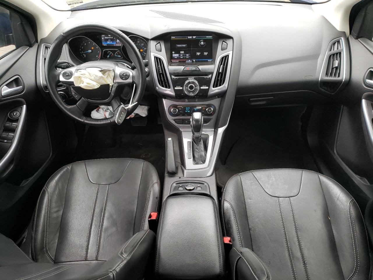 2014 Ford Focus Titanium VIN: 1FADP3J23EL291295 Lot: 55395894