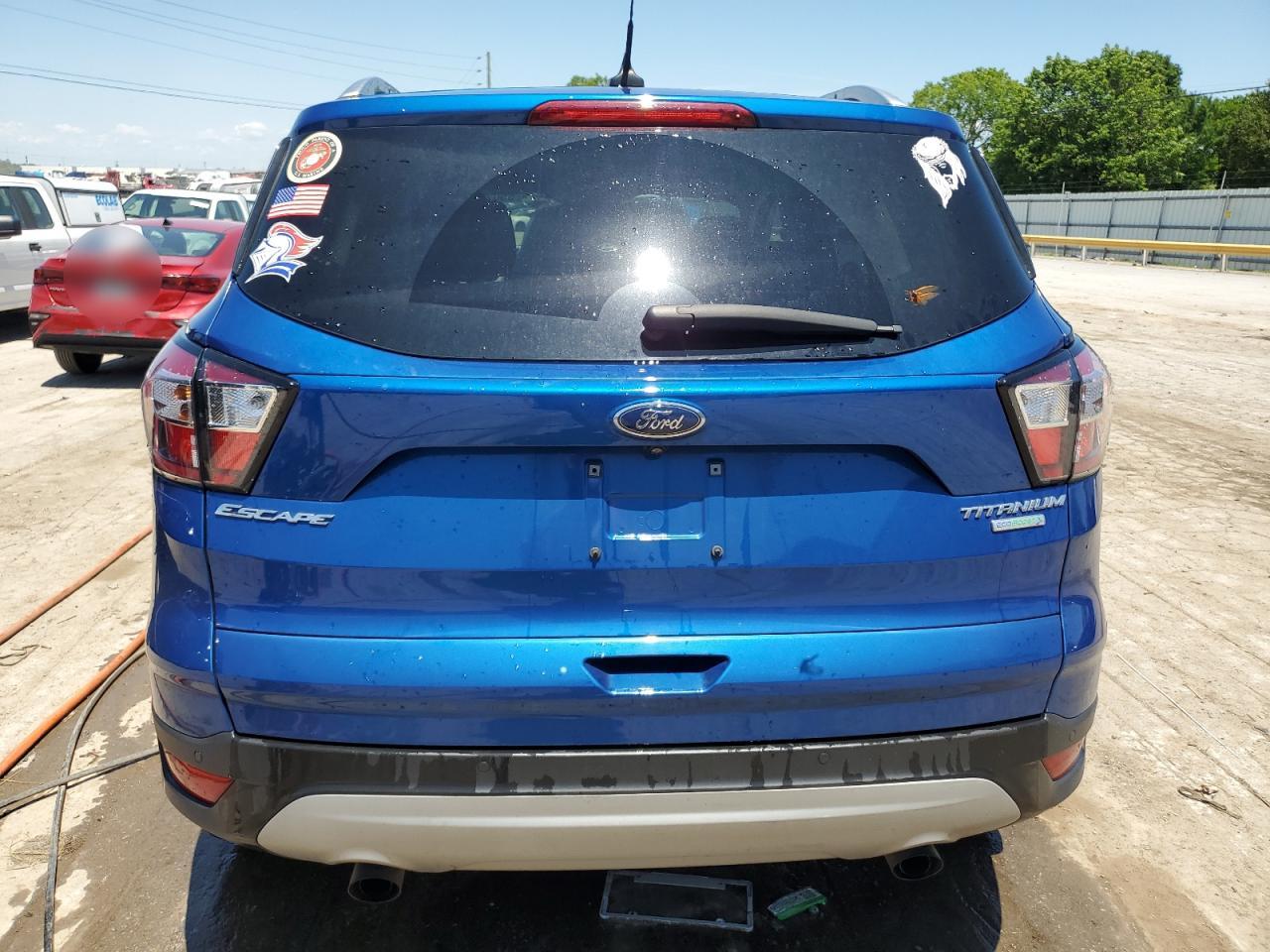 2018 Ford Escape Titanium VIN: 1FMCU0J91JUC75090 Lot: 55876484