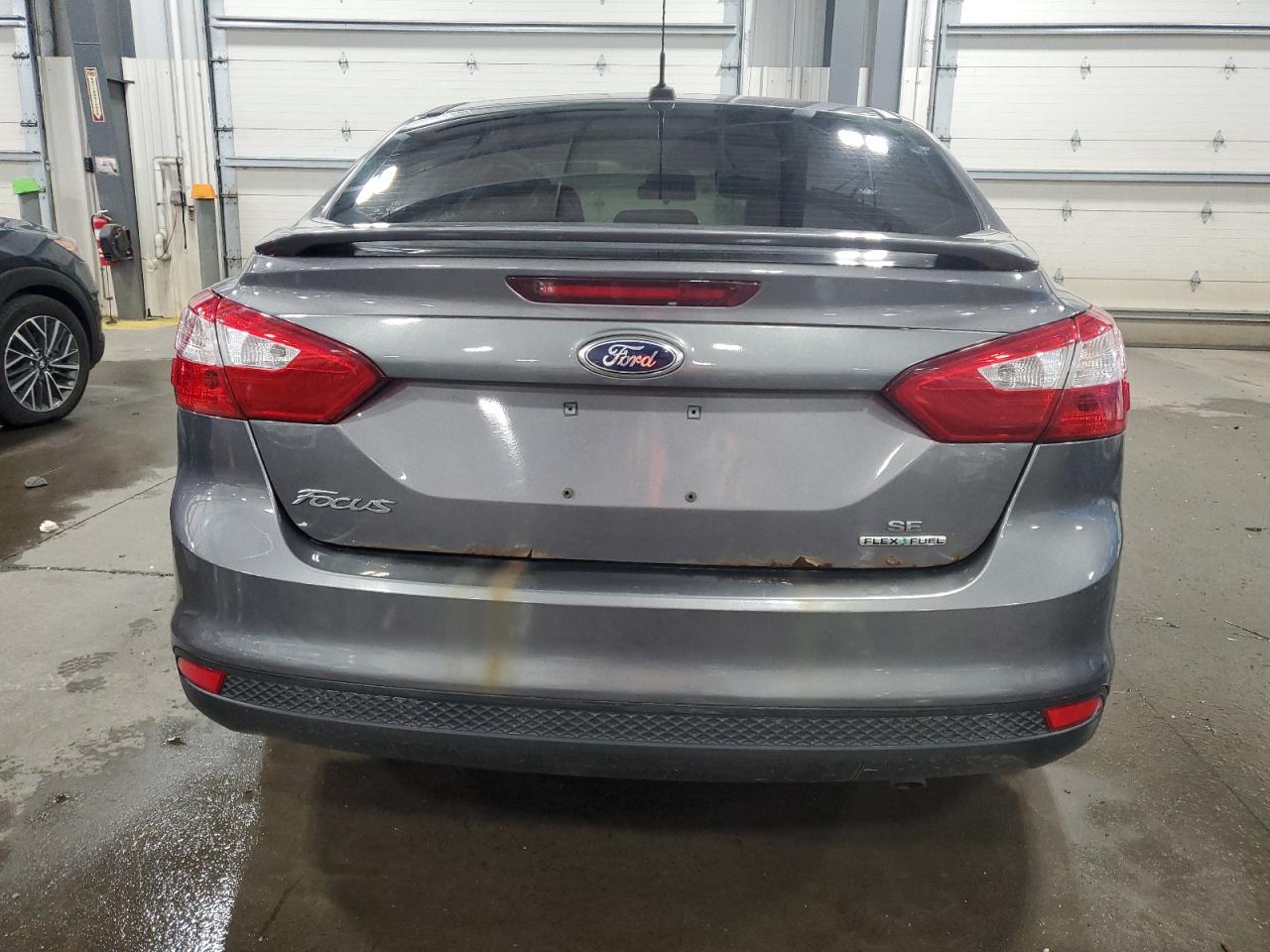 2013 Ford Focus Se VIN: 1FADP3F21DL164102 Lot: 55081734