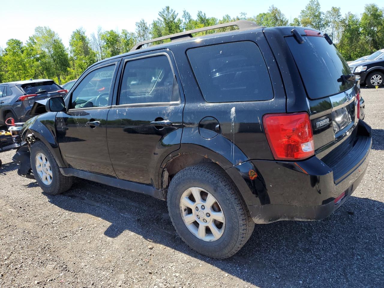 2009 Mazda Tribute I VIN: 4F2CZ02799KM05997 Lot: 56693844