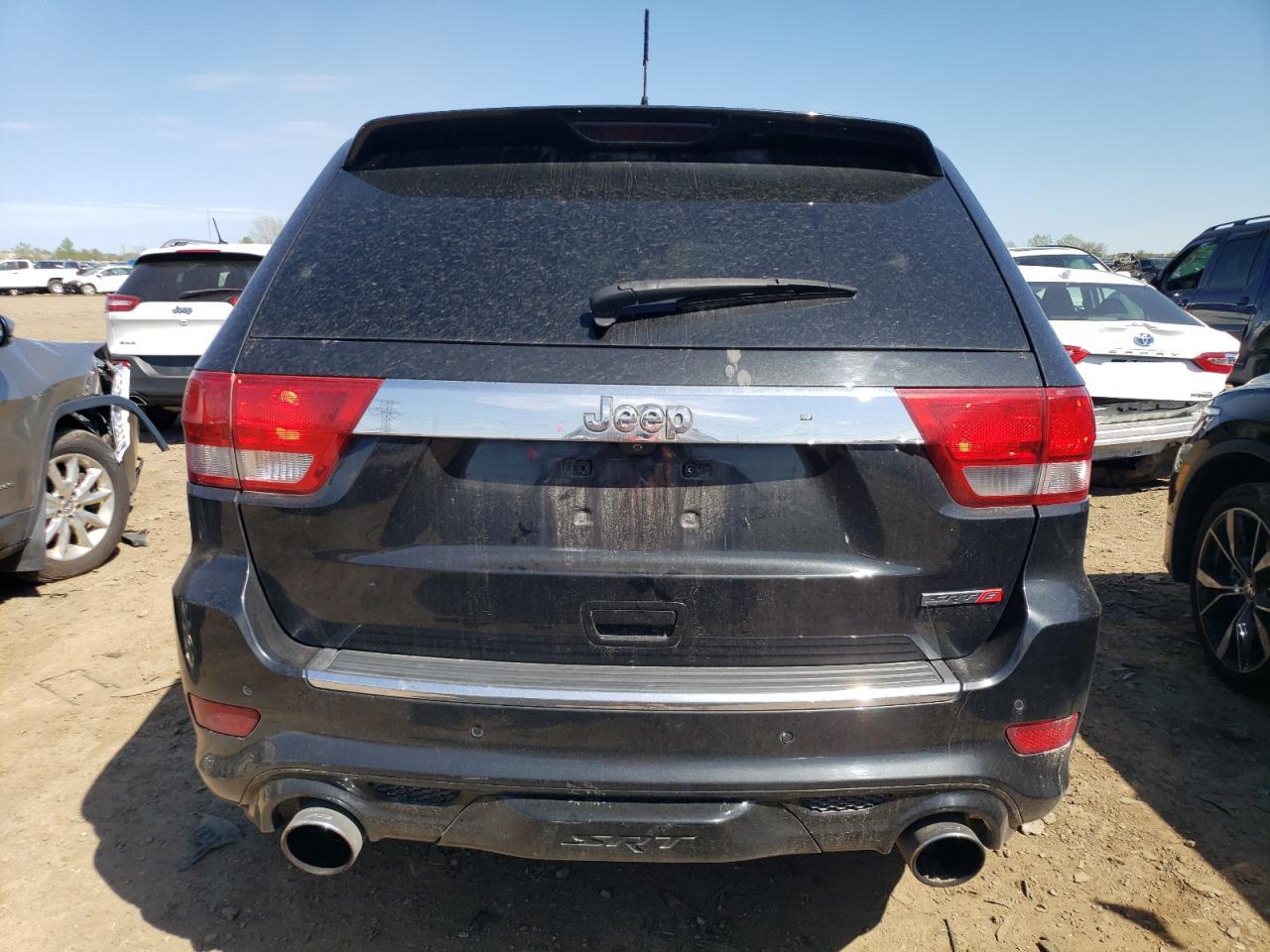 2012 Jeep Grand Cherokee Srt-8 VIN: 1C4RJFDJ2CC352056 Lot: 48810994