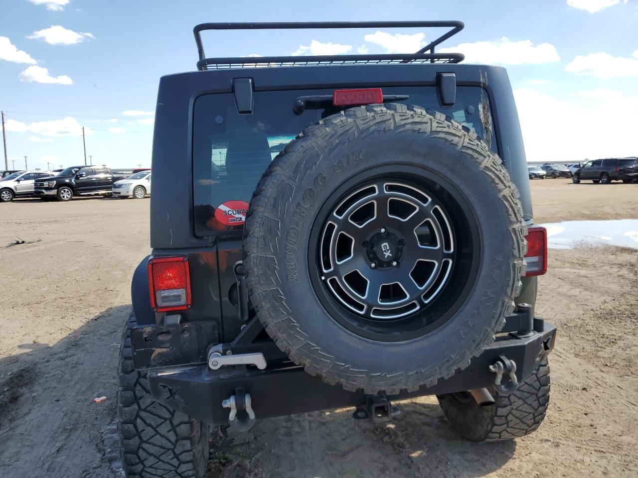 1C4BJWDG9FL746339 2015 Jeep Wrangler Unlimited Sport