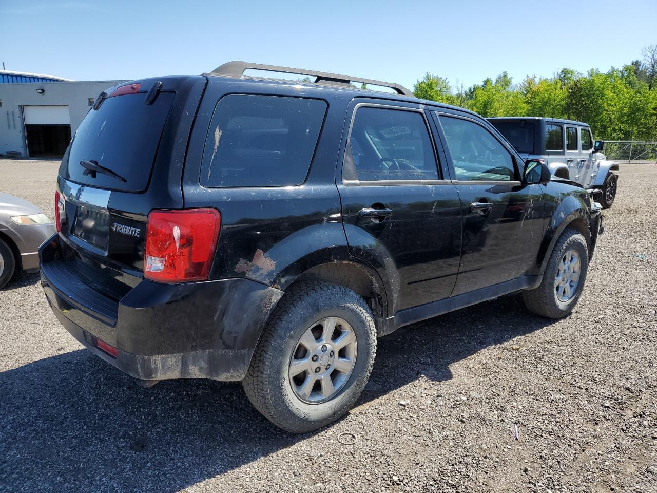 2009 Mazda Tribute I VIN: 4F2CZ02799KM05997 Lot: 56693844