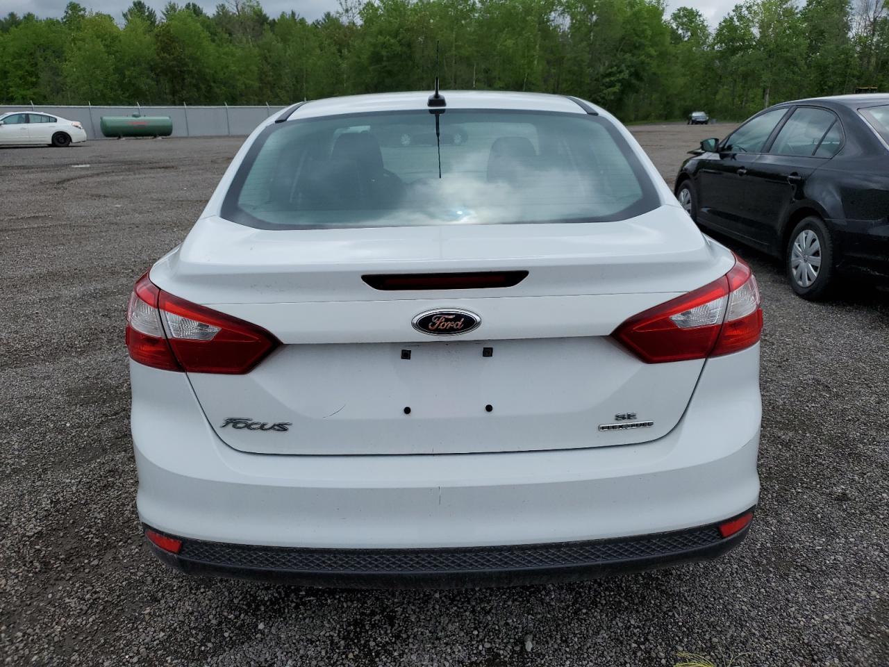 2014 Ford Focus Se VIN: 1FADP3F26EL239748 Lot: 56584714